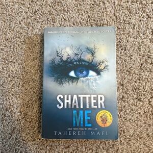 Shatter Me Book by Tahereh Mafi paperback science fiction book